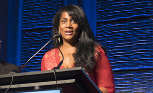 web-crop Regina-Heyward-podium